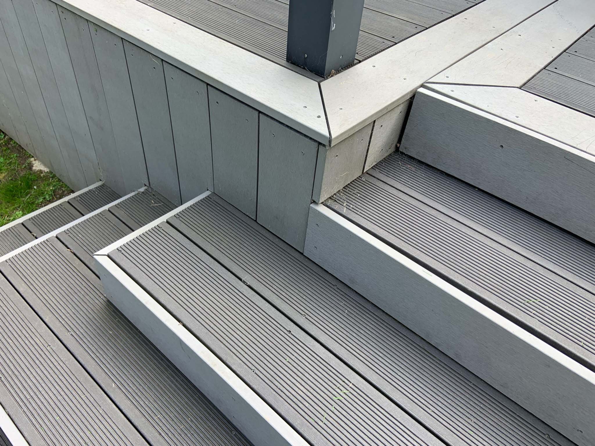Close up of some grey sustainable composite decking