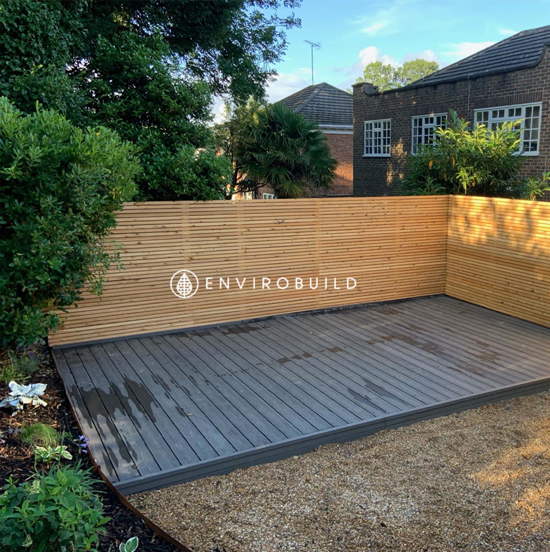 Some Sustainable Composite Decking with the Envirobuild Logo on top